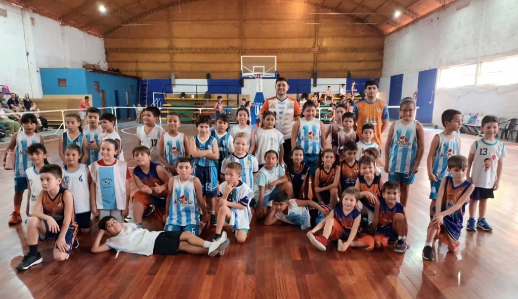 Youth basketball players training in a professional gymnasium in Argentina