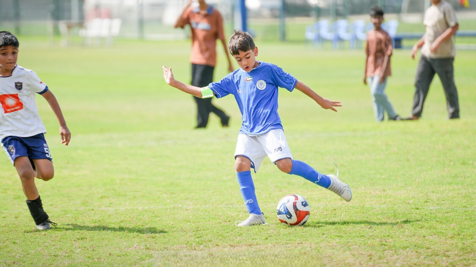 A modern football stadium in Dubai, host to international youth football tournaments