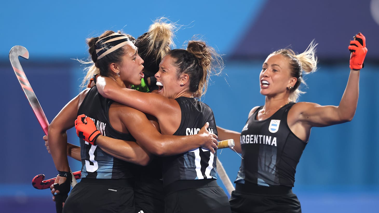 Argentina women’s field hockey team, Las Leonas, celebrating a goal in their light-blue and white kit