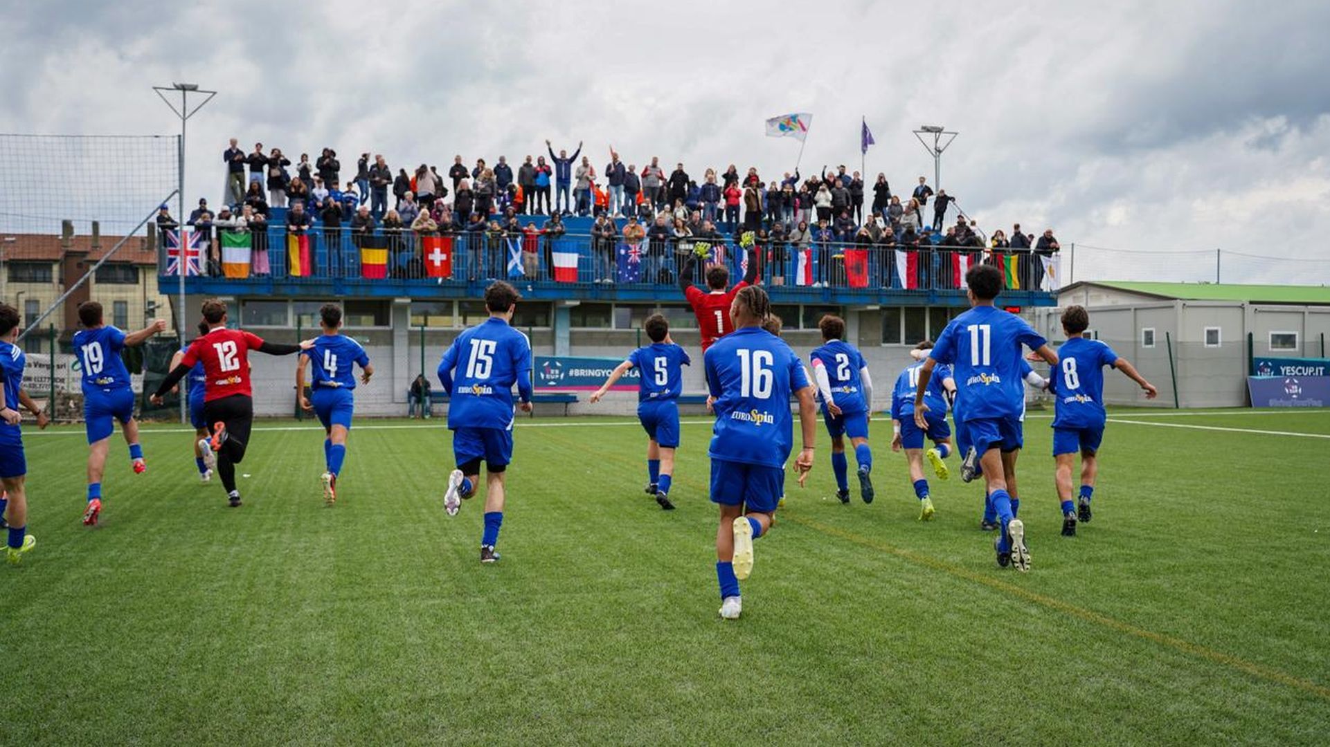 Young footballers competing at a youth tournament in Europe