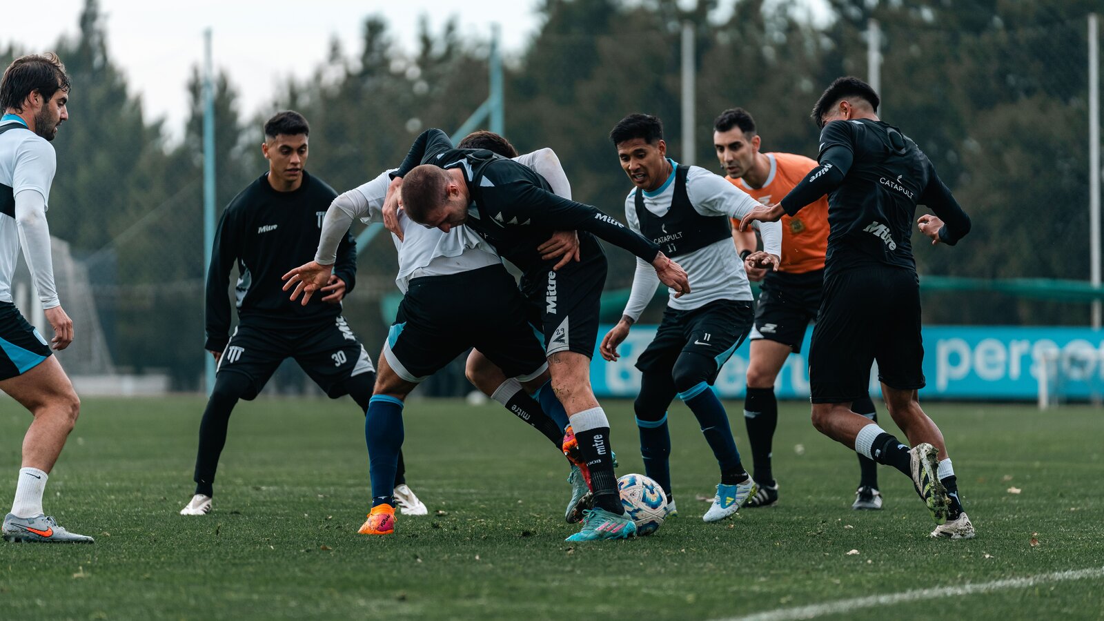 A professional football team training at a pre-season camp