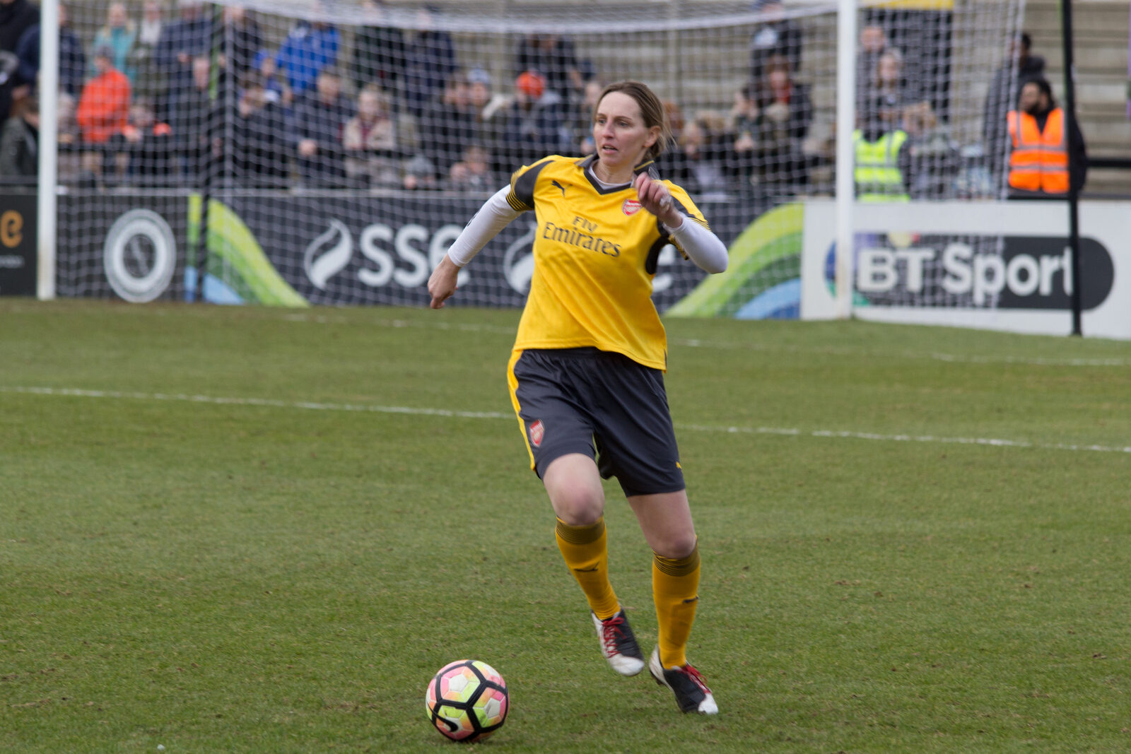 A professional women's football team in action on tour